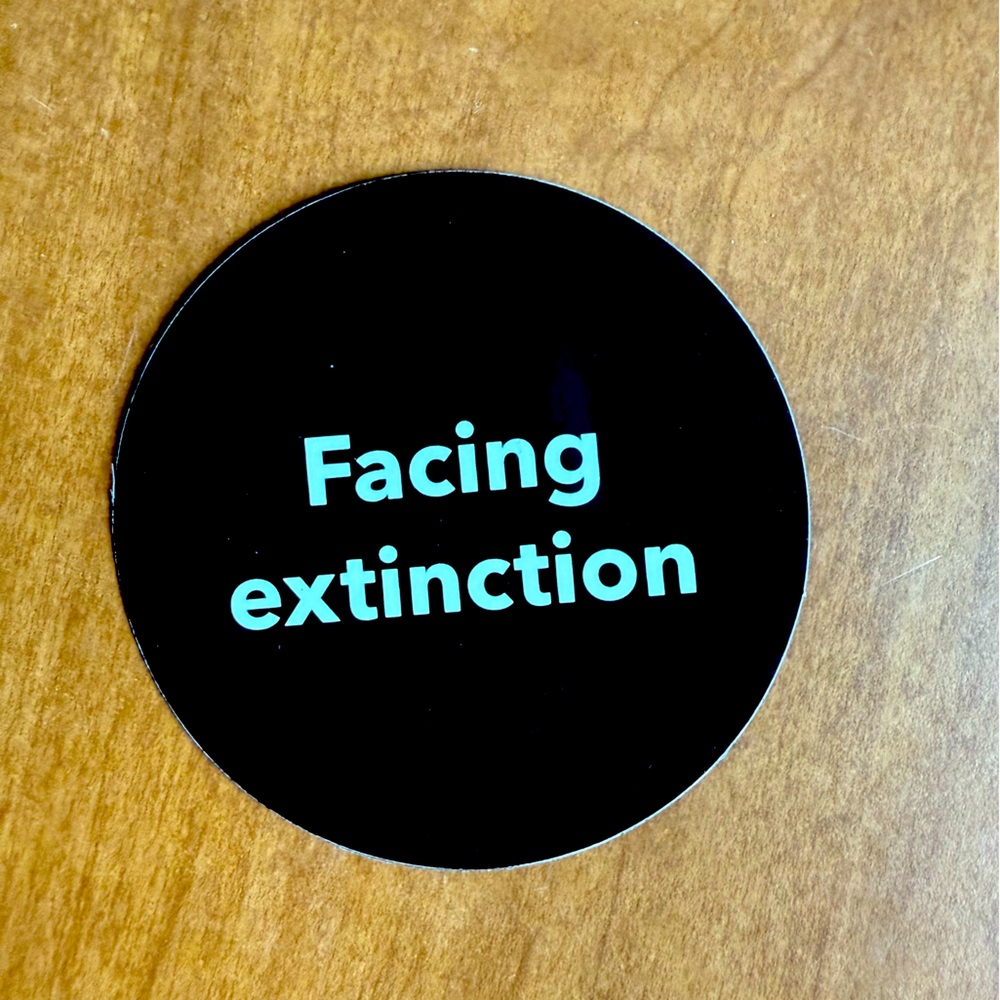 Facing Extinction Patagonia sticker